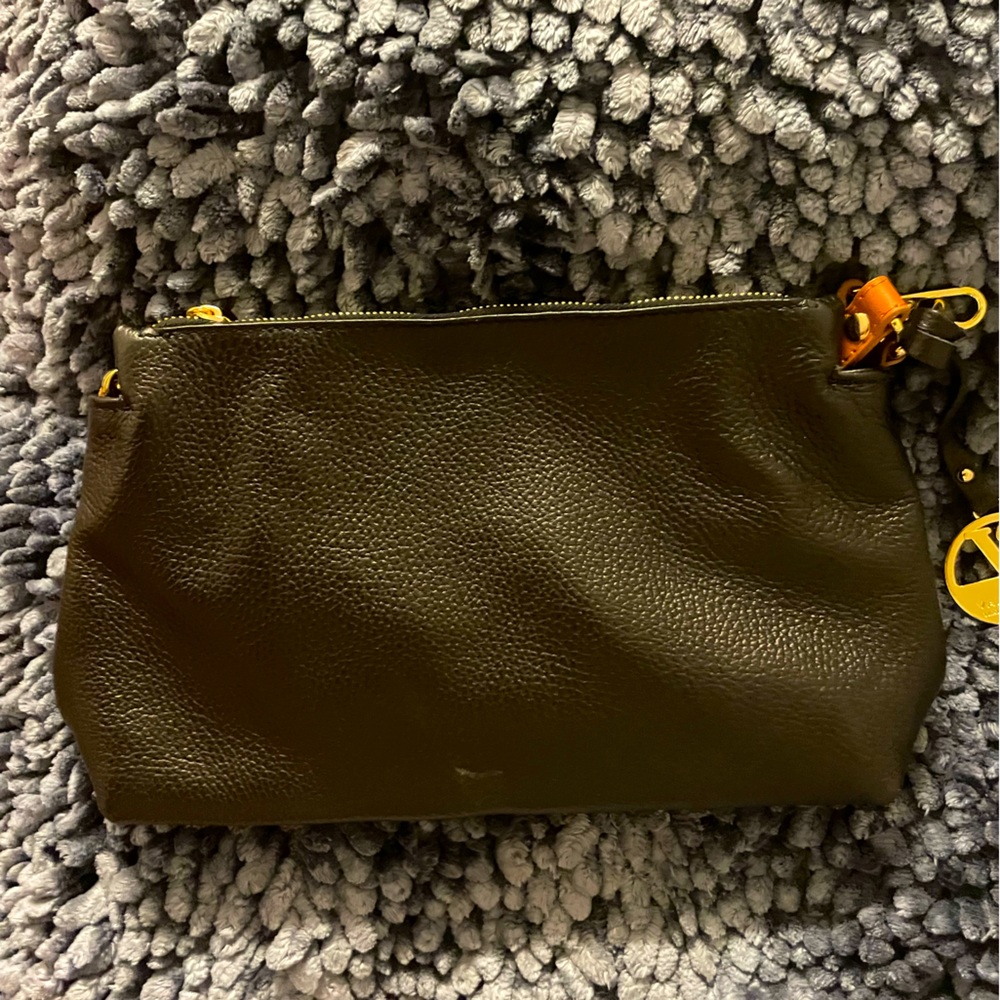 Valentina NWOT black pebbled multiple pocket convertible purse.